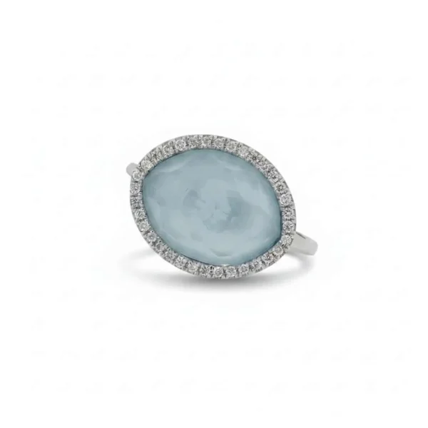 18ct white gold Sky blueTopaz, mother of pearl doublet and diamond halo cocktail dress ring.